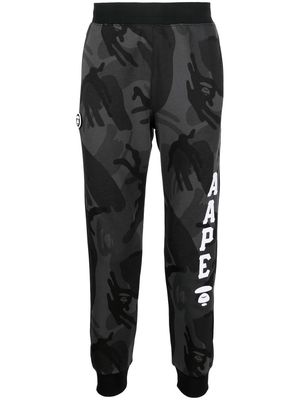 A BATHING APE® camouflage logo-print track pants - Black