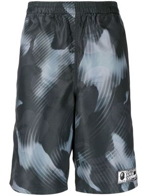 A BATHING APE® graphic-print track shorts - Green