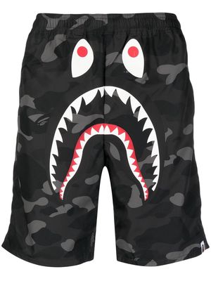 A BATHING APE® graphic shark-print deck shorts - Black