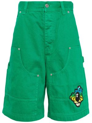 A BATHING APE® logo-appliqué denim shorts - Green