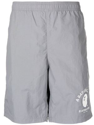 A BATHING APE® straight-leg logo-print shorts - Grey