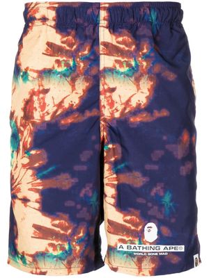 A BATHING APE® tie-dye logo swim shorts - Multicolour