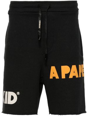 A Paper Kid logo-print cotton track shorts - Black