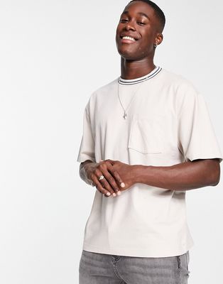 Abercrombie & Fitch tipped neck pocket oversized t-shirt in beige-Gray