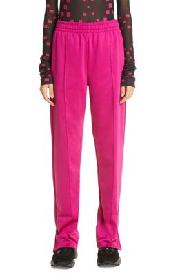 Acne Studios Feist Face Track Pants in Fuchsia Pink