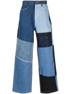 Ader Error denim-patchwork cotton jeans - Blue