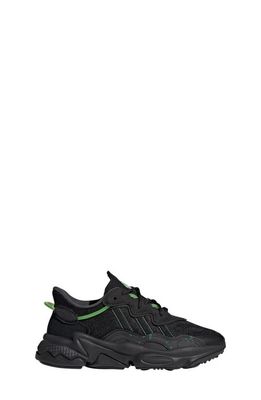 adidas Kids' Ozweego Sneaker in Black/Black/Solar Green