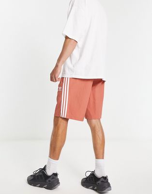 adidas Originals adicolor three stripe 10 inch shorts in beige-Brown