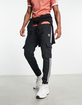 adidas Originals adicolor three stripe slim fit cargo sweatpants in black