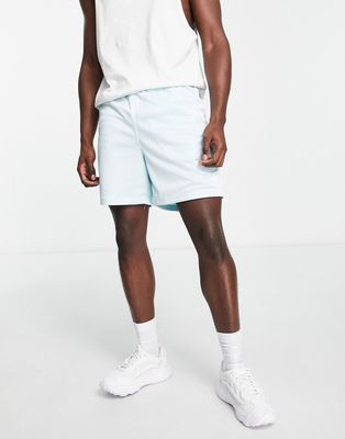 adidas Originals Essentials basketball style shorts in almost blue