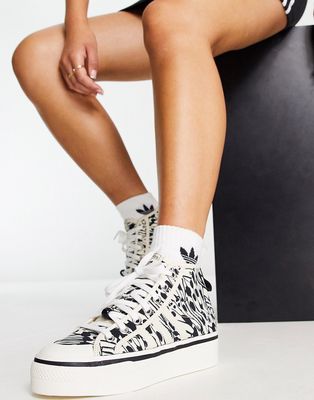 adidas Originals Nizza Platform Mid sneakers in white with butterfly print