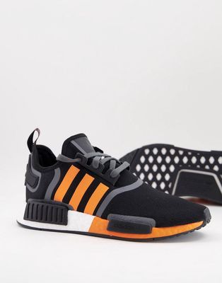 adidas Originals NMD_R1 sneakers in black with orange stripes