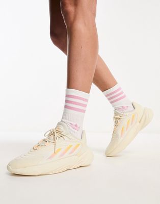 adidas Originals Ozelia sneakers in white and yellow