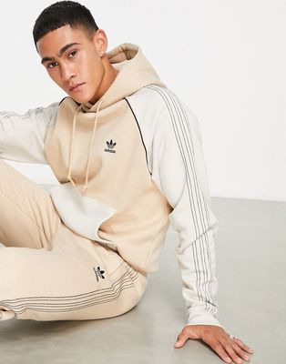 adidas Originals SPRT boyfriend fit hoodie in magic beige with contrast arms and pocket-Brown