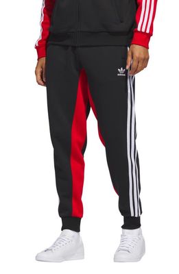 adidas Originals SST Fleece Track Pants in Black/Shadow Red