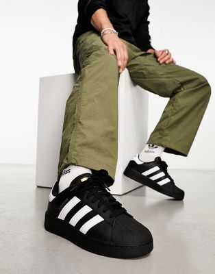 adidas Originals Superstar XLG sneakers in black and white
