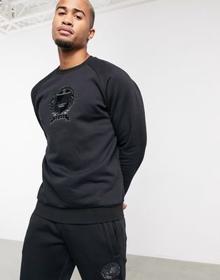 adidas Originals sweatpants with collegiate crest in black fleece