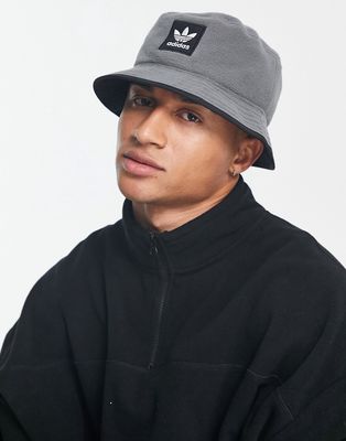 adidas Originlas reversible fleece Bucket hat in gray and black