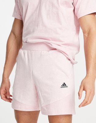 adidas Sportstyle Botantical Dye logo shorts in pink