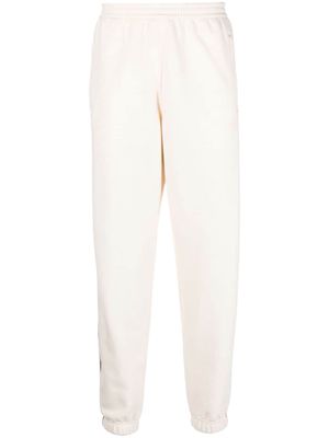 adidas stripe-detail tapered track pants - Neutrals