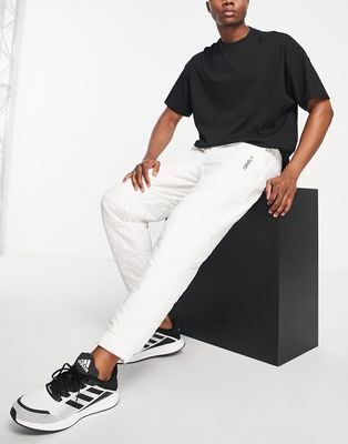 adidas Terrex unisex Prima padded sweatpants in white
