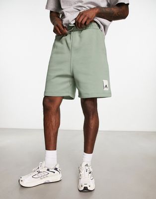 adidas Training Lounge shorts in green