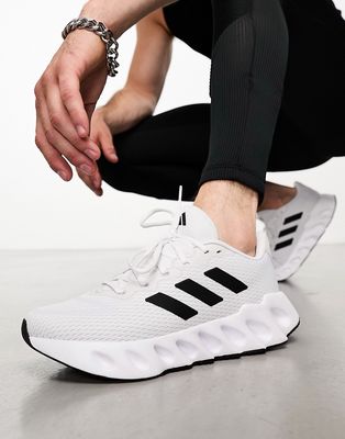 adidas Training Swift sneakers in white and black