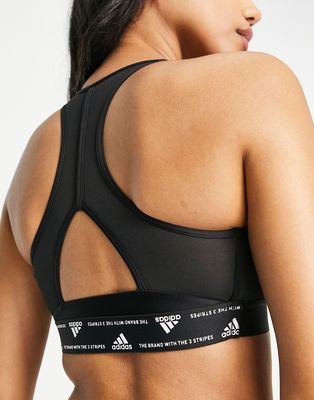 adidas Training tonal chest logo mid-support sports bra in black