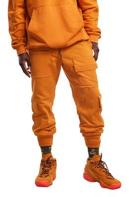 adidas x IVY PARK French Terry Cargo Sweatpants in Focus Orange