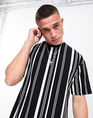 ADPT oversized t-shirt in black with white stripe