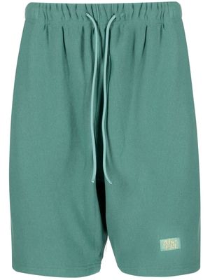 Advisory Board Crystals logo-embroidered cotton track shorts - Green