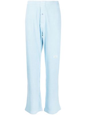 Advisory Board Crystals logo-patch track pants - Blue