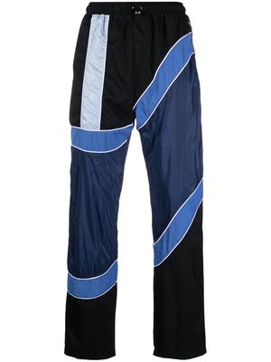 Ahluwalia colour-block stripe-detail trousers - Blue