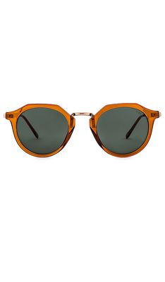 AIRE Taures Round Sunglasses in Orange.