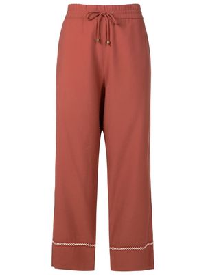Alcaçuz contrasting-trim straight trousers - Red