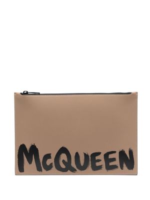 Alexander McQueen graffiti logo-print clutch - Brown