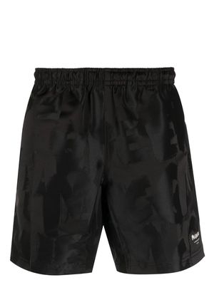 Alexander McQueen logo-jacquard swim shorts - Black