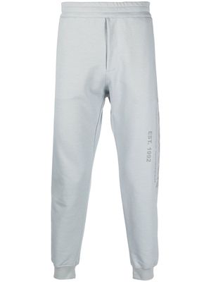 Alexander McQueen logo-print cotton track pants - Grey