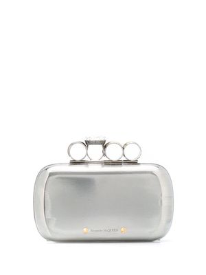 Alexander McQueen Rings metallic clutch bag