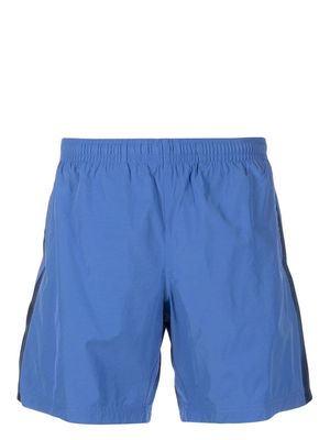Alexander McQueen Selvedge logo-jacquard swim shorts - Blue