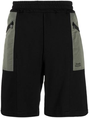 Alexander McQueen two-tone elasticated track shorts - Black
