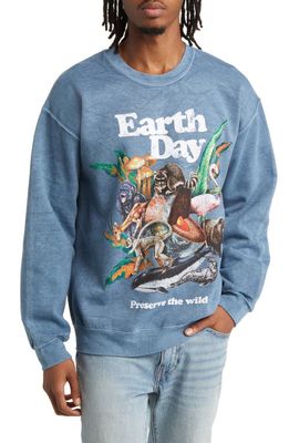 ALPHA COLLECTIVE Earth Day Graphic Crewneck Sweatshirt in Washed Blue