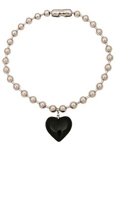 Amber Sceats Oversized Heart Necklace in Metallic Silver.