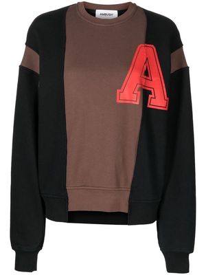 AMBUSH collegiate-print patchwork sweatshirt - BLACK VALIANT POPPY