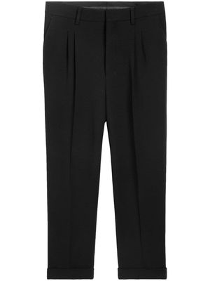 AMI Paris pressed-crease pleated tapered trousers - Black