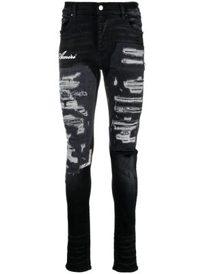 AMIRI Artisanal distressed slim-fit jeans - Black