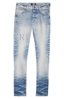 AMIRI Bandana Core Logo Distressed Stretch Denim Jeans in Vintage Indigo
