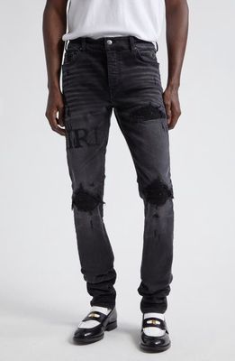 AMIRI Bouclé Logo Ripped MX1 Skinny Jeans in Faded Black