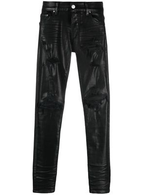 AMIRI coated-finish distressed jeans - Black
