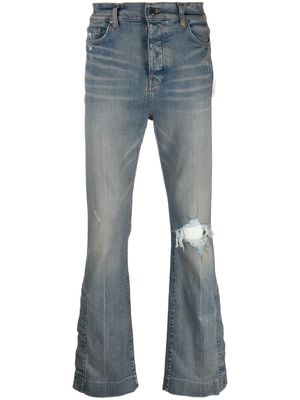AMIRI distressed bootcut jeans - Blue